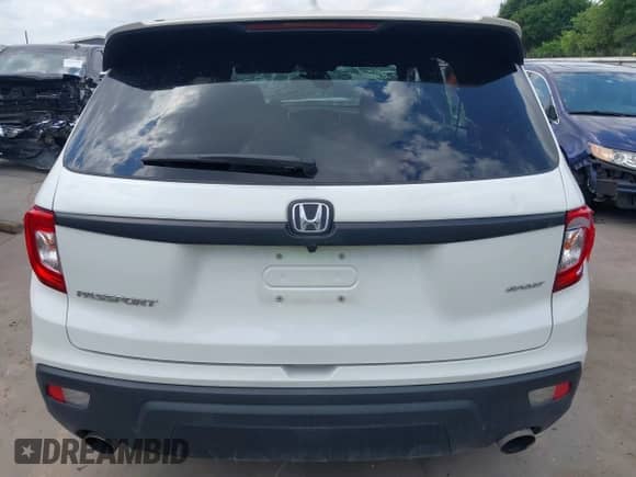 2021 Honda Passport Sport z VIN 5FNYF7H27MB015442, wystawiony jako IAAI lot #42040671 z przebiegiem 54 119 mil mil oraz . Historia ofert i sprzedaży dostępna na DreamBid. Obrazek 17.