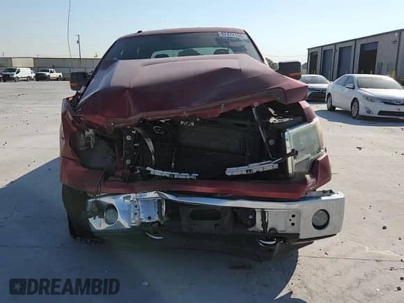 2013 Ford F-150 XLT z VIN 1FTFW1EF8DFB02189, wystawiony jako Copart lot #82472155 z przebiegiem 233 915 mil mil oraz Szkoda całkowita • Salvage title. Historia ofert i sprzedaży dostępna na DreamBid. Obrazek 14.