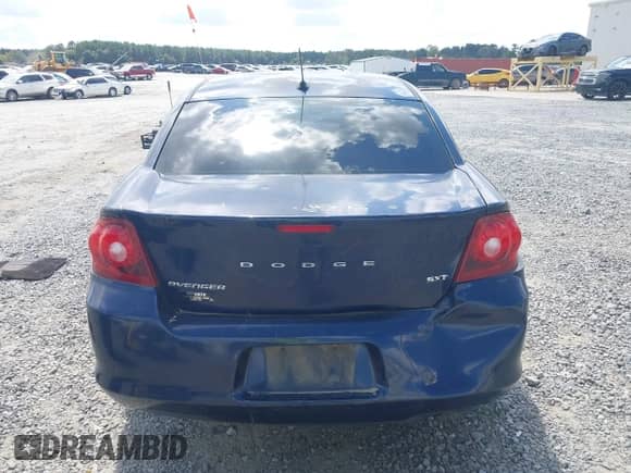 2013 Dodge Avenger SXT with VIN 1C3CDZCBXDN615817, listed as a IAAI auction lot 43282287 with 245,259 mi miles and . Bid and sale history available at DreamBid. Image 16.