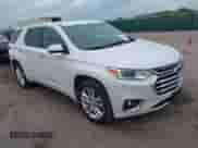 2021 Chevrolet Traverse High Country z VIN 1GNEVNKW6MJ136436, wystawiony jako IAAI lot #42879320 z przebiegiem 71 677 mil mil oraz . Historia ofert i sprzedaży dostępna na DreamBid. Obrazek 1.