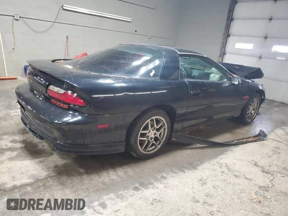 1994 Chevrolet Camaro Z28 z VIN 2G1FP22P2R2173826, wystawiony jako Copart lot #83315694 z przebiegiem 84 732 mil mil oraz Szkoda całkowita • Salvage title. Historia ofert i sprzedaży dostępna na DreamBid. Obrazek 3.