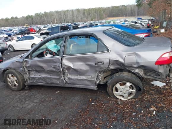 2000 Honda Accord EX with VIN 1HGCG5651YA129056, listed as a IAAI auction lot 41532787 with Not provided miles and . Bid and sale history available at DreamBid. Image 14.