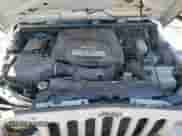 2012 Jeep Wrangler Sport with VIN 1C4AJWAG5CL220348, listed as a Copart auction lot 69854545 with 124,454 mi miles and Salvage title. Bid and sale history available at DreamBid. Image 12.