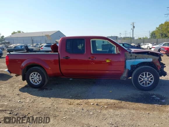 2019 Nissan Frontier SV with VIN 1N6DD0FR7KN756374, listed as a IAAI auction lot 43205475 with 76,574 mi miles and . Bid and sale history available at DreamBid. Image 14.