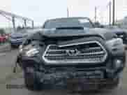 2017 Toyota Tacoma SR5 with VIN 3TMAZ5CN3HM026387, listed as a IAAI auction lot 42362780 with 216,739 mi miles and . Bid and sale history available at DreamBid. Image 6.