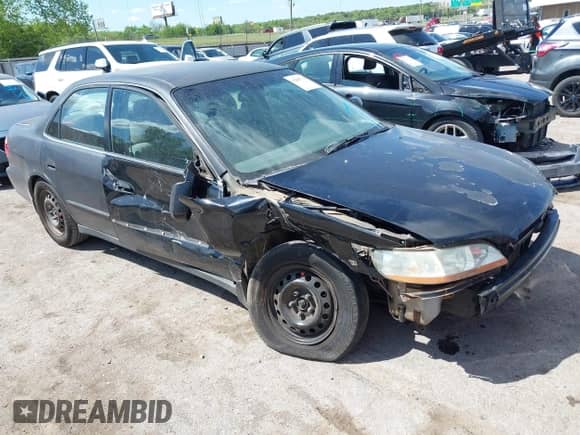 2000 Honda Accord LX with VIN 1HGCG1649YA083587, listed as a IAAI auction lot 42083716 with 268,423 mi miles and . Bid and sale history available at DreamBid. Image 1.