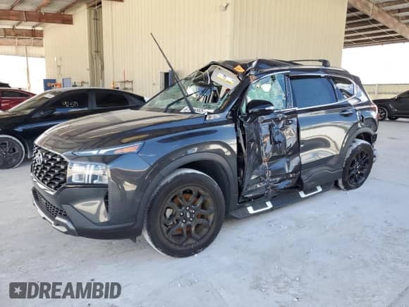 2022 Hyundai Santa Fe XRT с VIN 5NMS64AJXNH386472, выставлен на аукционе Copart как лот 67816895 с пробегом Не указан миль и На запчасти • Non repairable. История ставок и продаж доступна на DreamBid. Изображение 1.