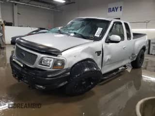 2000 Ford F-150 XL with VIN 1FTRX08L5YKB45648, listed as a Copart auction lot 51141035 with 160,844 mi miles and Salvage title. Bid and sale history available at DreamBid. Image 1.