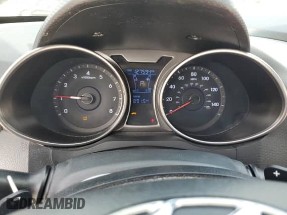 2014 Hyundai Veloster z VIN KMHTC6AD3EU196343, wystawiony jako Copart lot #59891375 z przebiegiem 127 594 mil mil oraz Szkoda całkowita • Salvage title. Historia ofert i sprzedaży dostępna na DreamBid. Obrazek 9.