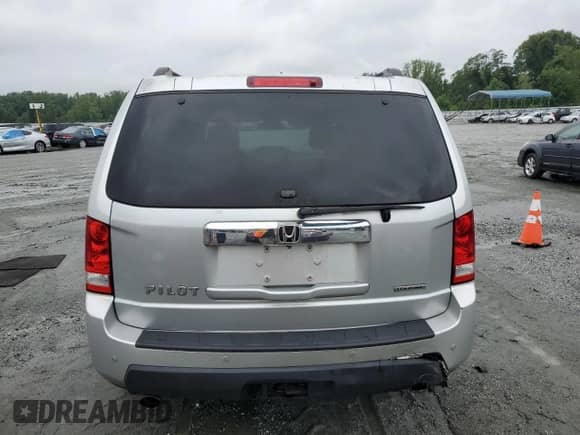 2009 Honda Pilot Touring with VIN 5FNYF38839B027611, listed as a Copart auction lot 67812505 with 148,357 mi miles and Salvage title. Bid and sale history available at DreamBid. Image 6.