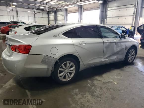 2016 Chevrolet Impala LT with VIN 2G1115S32G9127069, listed as a Copart auction lot 70531515 with 132,990 mi miles and Salvage title. Bid and sale history available at DreamBid. Image 3.
