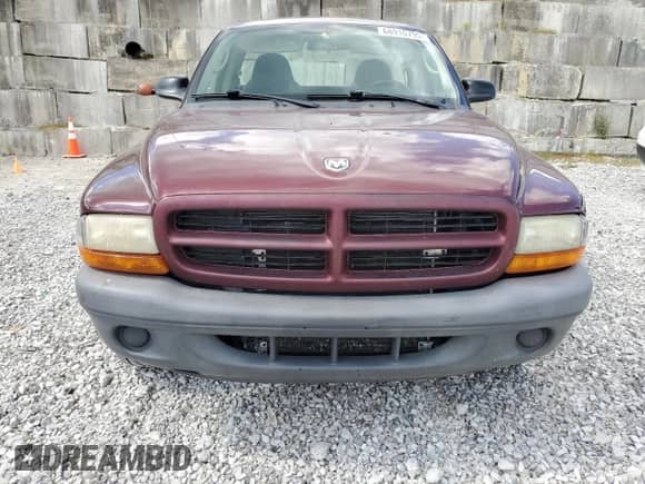 2003 Dodge Dakota z VIN 1D7FL16X23S362034, wystawiony jako Copart lot #68910795 z przebiegiem 123 052 mil mil oraz Szkoda całkowita • Salvage title. Historia ofert i sprzedaży dostępna na DreamBid. Obrazek 5.