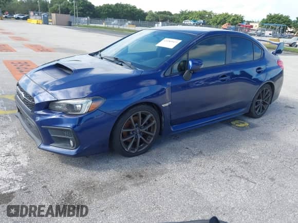2019 Subaru WRX Limited with VIN JF1VA1P65K8815775, listed as a IAAI auction lot 43289927 with 130,856 mi miles and . Bid and sale history available at DreamBid. Image 2.