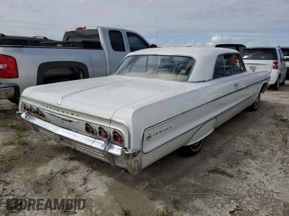 1964 Chevrolet Impala с VIN 41847J219664, выставлен на аукционе Copart как лот 75891214 с пробегом 47 312 миль миль и Списание • Salvage title. История ставок и продаж доступна на DreamBid. Изображение 3.