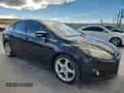 2014 Ford Focus Titanium with VIN 1FADP3J28EL224272, listed as a Copart auction lot 86531015 with 192,653 mi miles and Clean title. Bid and sale history available at DreamBid. Image 4.