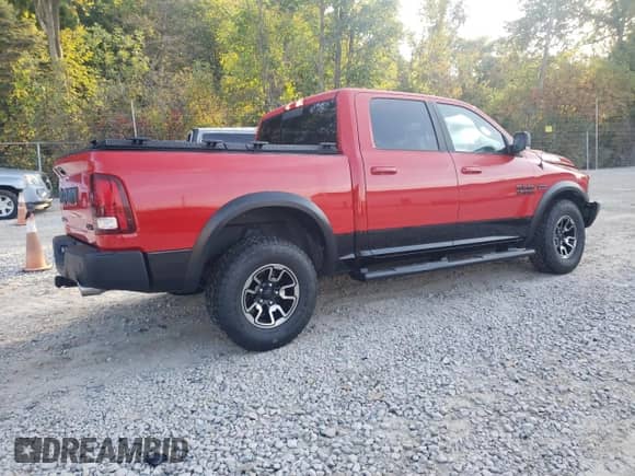 2018 Ram 1500 Rebel z VIN 1C6RR7YT9JS161674, wystawiony jako Copart lot #81022945 z przebiegiem 66 817 mil mil oraz Szkoda całkowita • Salvage title. Historia ofert i sprzedaży dostępna na DreamBid. Obrazek 3.