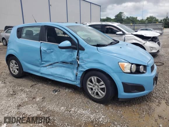 2014 Chevrolet Sonic LT with VIN 1G1JC6SB7E4180583, listed as a Copart auction lot 61265335 with 114,047 mi miles and Salvage title. Bid and sale history available at DreamBid. Image 4.