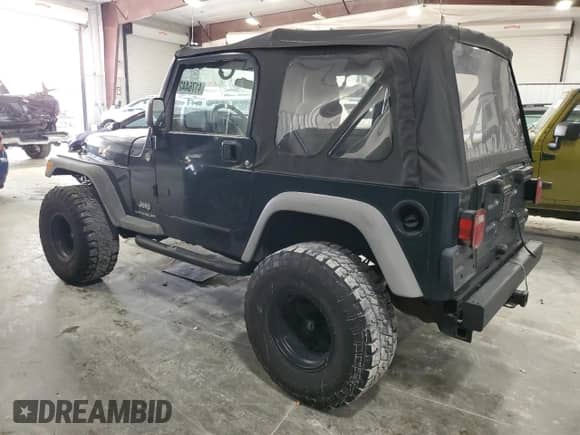 2006 Jeep Wrangler SE z VIN 1J4FA29S36P724699, wystawiony jako Copart lot #41764425 z przebiegiem 129 016 mil mil oraz Szkoda całkowita • Salvage title. Historia ofert i sprzedaży dostępna na DreamBid. Obrazek 2.