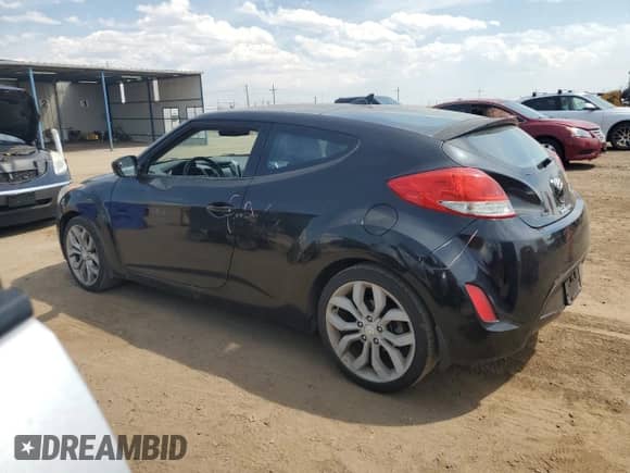 2013 Hyundai Veloster w/Black Int z VIN KMHTC6AD1DU125253, wystawiony jako Copart lot #67401815 z przebiegiem 105 150 mil mil oraz Szkoda całkowita • Salvage title. Historia ofert i sprzedaży dostępna na DreamBid. Obrazek 2.