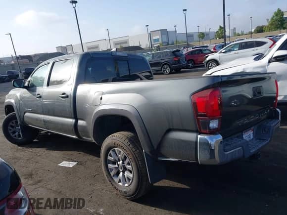 2018 Toyota Tacoma SR5 z VIN 3TMBZ5DN8JM013191, wystawiony jako IAAI lot #42555761 z przebiegiem 34 542 mil mil oraz . Historia ofert i sprzedaży dostępna na DreamBid. Obrazek 15.