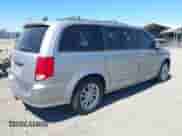 2014 Dodge Grand Caravan SXT 30th Anniversary with VIN 2C4RDGCGXER206694, listed as a IAAI auction lot 42818180 with 123,214 mi miles and . Bid and sale history available at DreamBid. Image 4.