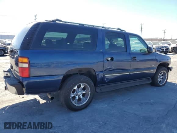 2000 Chevrolet Suburban LS с VIN 3GNEC16T7YG229228, выставлен на аукционе Copart как лот 71917695 с пробегом 190 311 миль миль и Списание • Salvage title. История ставок и продаж доступна на DreamBid. Изображение 3.