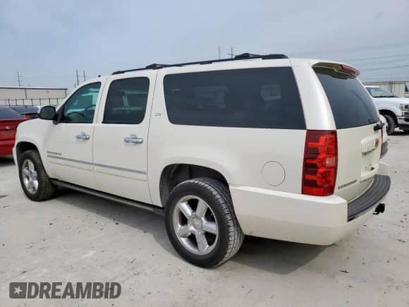 2014 Chevrolet Suburban LTZ with VIN 1GNSKKE79ER231994, listed as a Copart auction lot 71830095 with 152,865 mi miles and Clean title. Bid and sale history available at DreamBid. Image 2.