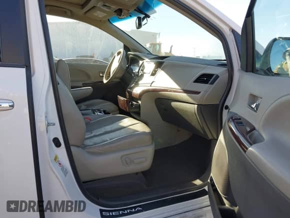 2013 Toyota Sienna XLE AAS with VIN 5TDYK3DC3DS308298, listed as a IAAI auction lot 41292280 with 165,638 mi miles and . Bid and sale history available at DreamBid. Image 5.