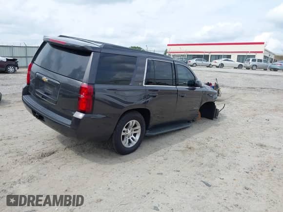 2018 Chevrolet Tahoe LT z VIN 1GNSKBKCXJR103730, wystawiony jako IAAI lot #42125208 z przebiegiem 212 360 mil mil oraz . Historia ofert i sprzedaży dostępna na DreamBid. Obrazek 4.