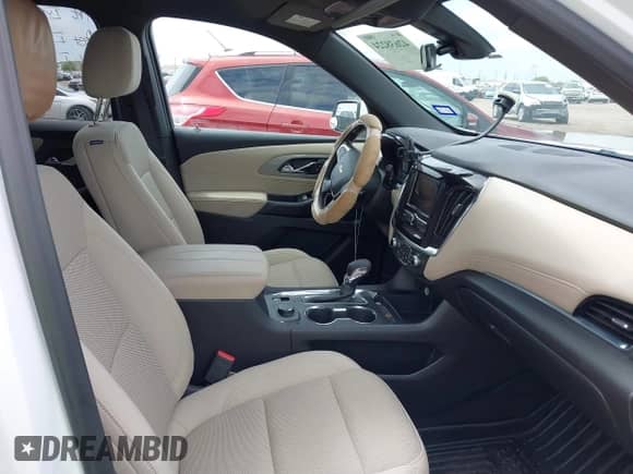 2023 Chevrolet Traverse LS z VIN 1GNERFKW0PJ168703, wystawiony jako IAAI lot #42638224 z przebiegiem 56 743 mil mil oraz . Historia ofert i sprzedaży dostępna na DreamBid. Obrazek 5.