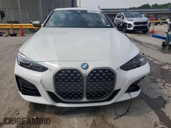 2021 BMW 4 Series M440i xDrive с VIN WBA13AR04MCF74724, выставлен на аукционе Copart как лот 59580625 с пробегом 76 810 миль миль и Списание • Salvage title. История ставок и продаж доступна на DreamBid. Изображение 5.