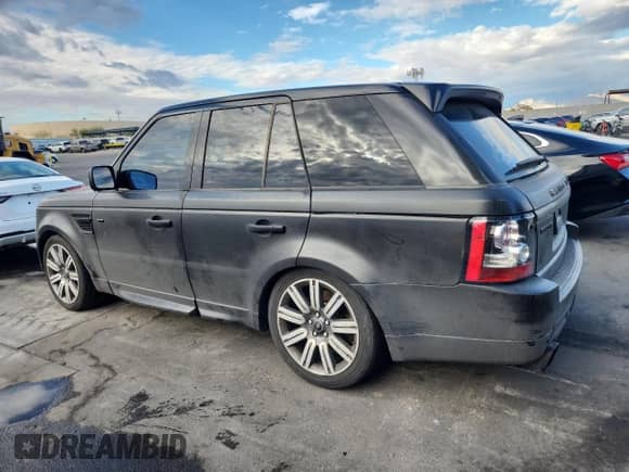 2013 Land Rover Range Rover Sport SC с VIN SALSH2E42DA801059, выставлен на аукционе Copart как лот 85378065 с пробегом 127 542 миль миль и Чистый • Clean title. История ставок и продаж доступна на DreamBid. Изображение 2.