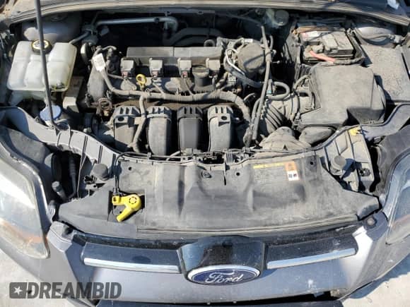 2014 Ford Focus Titanium с VIN 1FADP3N21EL204861, выставлен на аукционе Copart как лот 80388865 с пробегом 178 239 миль миль и Списание • Salvage title. История ставок и продаж доступна на DreamBid. Изображение 11.