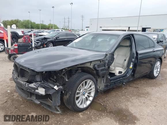 2014 BMW 7 Series ALPINA B7 with VIN WBAYE8C57ED134799, listed as a IAAI auction lot 41891633 with 96,411 mi miles and . Bid and sale history available at DreamBid. Image 18.