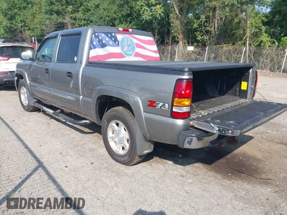 2006 GMC Sierra 1500 SLT with VIN 2GTEK13Z261326086, listed as a IAAI auction lot 42958079 with 144,604 mi miles and . Bid and sale history available at DreamBid. Image 3.