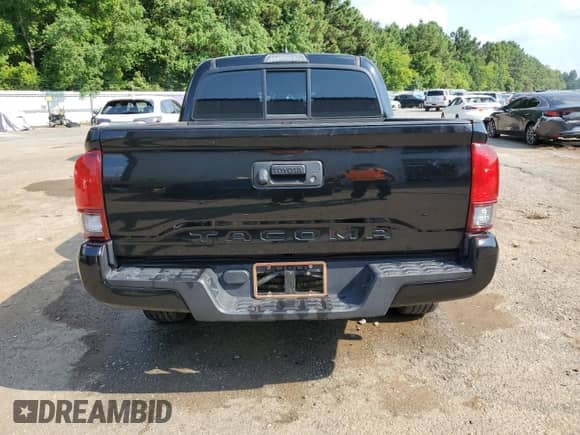 2018 Toyota Tacoma SR z VIN 5TFAX5GN2JX115996, wystawiony jako Copart lot #67276065 z przebiegiem 106 881 mil mil oraz Szkoda całkowita • Salvage title. Historia ofert i sprzedaży dostępna na DreamBid. Obrazek 6.