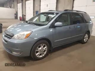 2005 Toyota Sienna XLE z VIN 5TDZA22C85S264451, wystawiony jako Copart lot #87071155 z przebiegiem 256 535 mil mil oraz Czysty tytuł • Clean title. Historia ofert i sprzedaży dostępna na DreamBid. Obrazek 1.