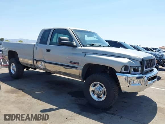 2000 Dodge 2500 with VIN 3B7KF236XYG142236, listed as a IAAI auction lot 42470859 with 341,432 mi miles and . Bid and sale history available at DreamBid. Image 6.