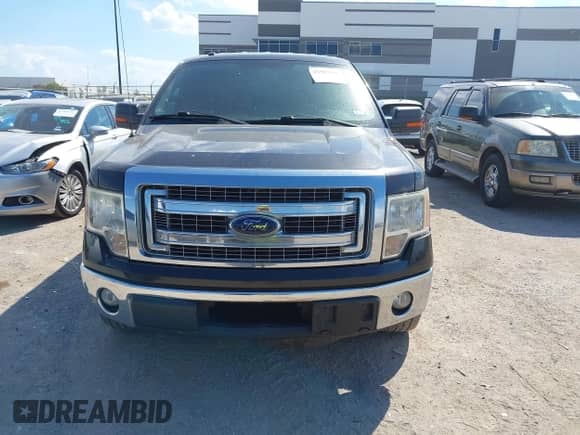 2013 Ford F-150 Lariat with VIN 1FTFW1CTXDKD46491, listed as a IAAI auction lot 43397196 with 238,334 mi miles and . Bid and sale history available at DreamBid. Image 12.