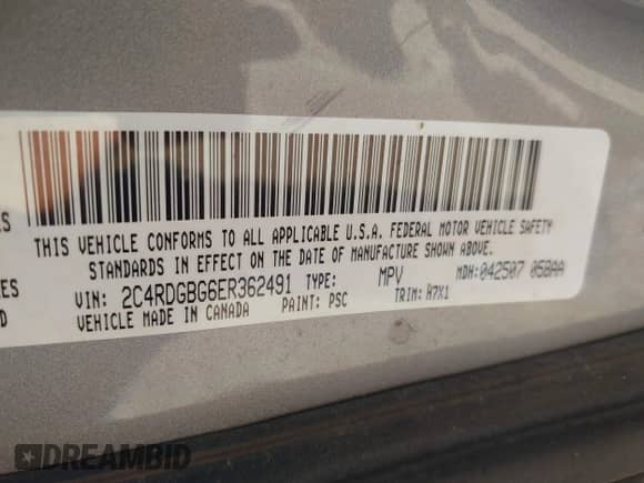 2014 Dodge Grand Caravan SE z VIN 2C4RDGBG6ER362491, wystawiony jako IAAI lot #42977761 z przebiegiem 240 771 mil mil oraz . Historia ofert i sprzedaży dostępna na DreamBid. Obrazek 9.