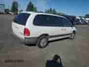 2000 Dodge Caravan SE with VIN 1B4GP44L3YB734876, listed as a Copart auction lot 72469374 with 215,240 mi miles and Salvage title. Bid and sale history available at DreamBid. Image 3.