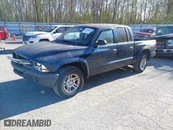 2004 Dodge Dakota Sport z VIN 1D7HL38K64S591081, wystawiony jako IAAI lot #42154889 z przebiegiem 235 228 mil mil oraz . Historia ofert i sprzedaży dostępna na DreamBid. Obrazek 2.