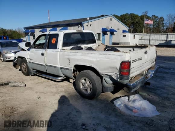 1998 Dodge 1500 with VIN 3B7HC12Y8WG217402, listed as a Copart auction lot 85560594 with 247,896 mi miles and Salvage title. Bid and sale history available at DreamBid. Image 2.
