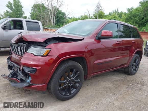 2020 Jeep Grand Cherokee Altitude with VIN 1C4RJFAG0LC233091, listed as a IAAI auction lot 42706976 with 66,255 mi miles and . Bid and sale history available at DreamBid. Image 17.
