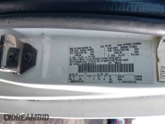 2002 Ford Econoline Cargo with VIN 1FTRE14262HB84357, listed as a IAAI auction lot 40880551 with 123,183 mi miles and . Bid and sale history available at DreamBid. Image 9.