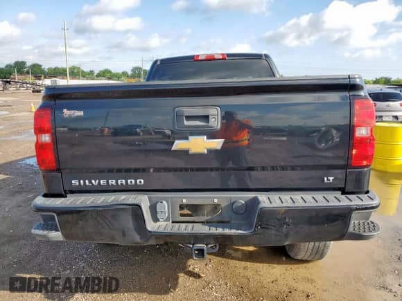 2017 Chevrolet Silverado 1500 LT with VIN 1GCVKREC4HZ401629, listed as a Copart auction lot 63997355 with 93,456 mi miles and Salvage title. Bid and sale history available at DreamBid. Image 6.
