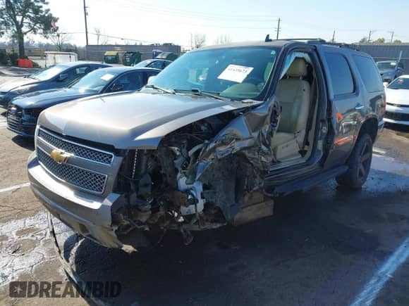 2014 Chevrolet Tahoe LTZ с VIN 1GNSKCE09ER154892, выставлен на аукционе IAAI как лот 41435673 с пробегом Не указан миль и . История ставок и продаж доступна на DreamBid. Изображение 2.