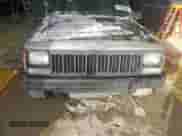 1992 Jeep Grand Cherokee with VIN 1J4FT88S5NL246158, listed as a Copart auction lot 87676655 with 1,418,563 mi miles and Salvage title. Bid and sale history available at DreamBid. Image 11.