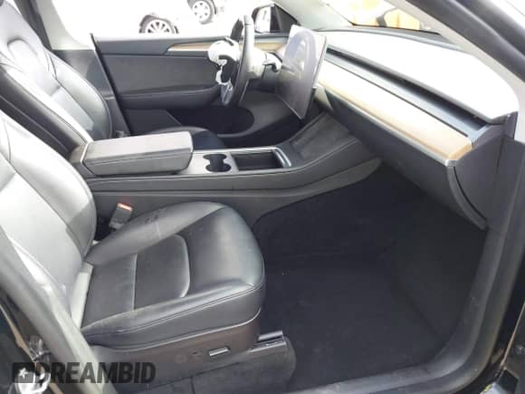 2023 Tesla Model Y Long Range с VIN 7SAYGAEE1PF594220, выставлен на аукционе IAAI как лот 42885301 с пробегом 94 878 миль миль и . История ставок и продаж доступна на DreamBid. Изображение 5.