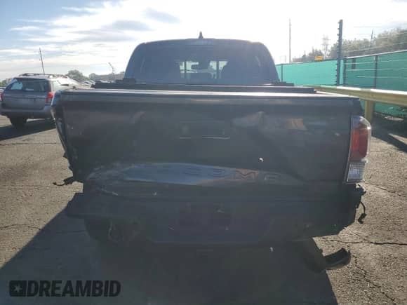 2023 Toyota Tacoma SR with VIN 3TMCZ5ANXPM559511, listed as a Copart auction lot 80508385 with 33,176 mi miles and Salvage title. Bid and sale history available at DreamBid. Image 6.